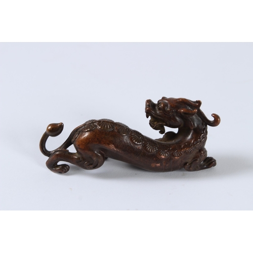95 - A JAPANESE BRONZE OKIMONO DRAGON. 8cms.