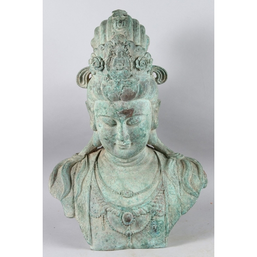 208 - A GOOD BRONZE STATUE BUST OF GUANYIN, also known as KWAN-YIN. 56cms high.