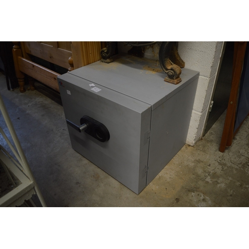 A modern safe complete with key.