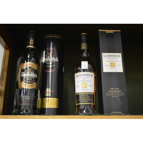 549 - A one litre bottle of Glenfiddich whisky together with a single bottle of Glenmorangie Quinta Ruban ... 