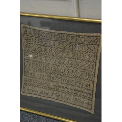 553 - Three 19th century framed and glazed alphabet samplers.