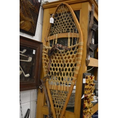 554 - A pair of snow shoes.