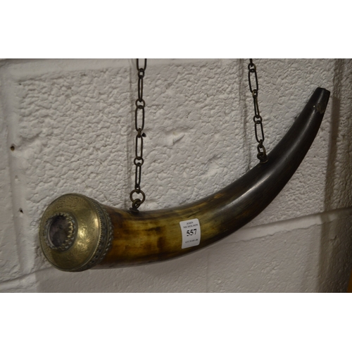 557 - A horn snuff or powder mull.