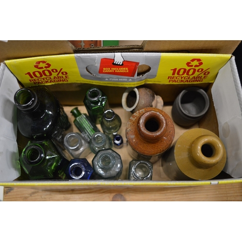 563 - Old bottles and jars.