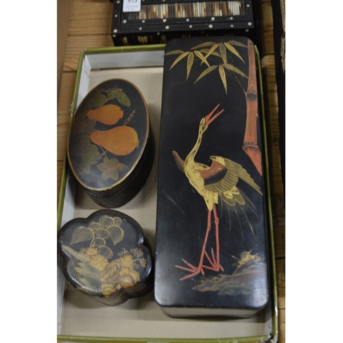 572 - Three Japanese lacquer boxes and covers.