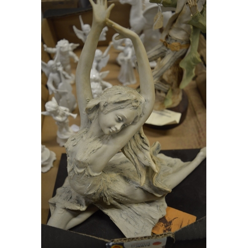 583 - White porcelain angelic musicians and other decorative figures.