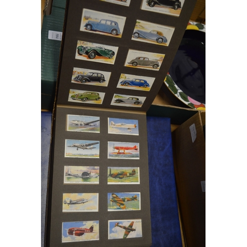 586 - A collection of cigarette cards in albums plus loose cards and The Topical Times Panel Portrait albu... 