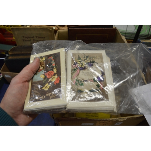 587 - A quantity of postcard albums and contents together with loose postcards.