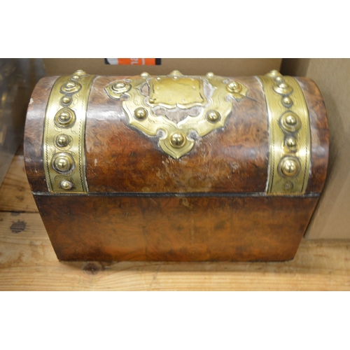 590 - A Victorian brass bound figured walnut stationery casket.