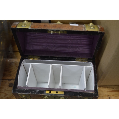 590 - A Victorian brass bound figured walnut stationery casket.