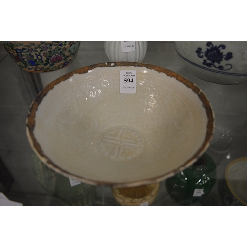 594 - Chinese porcelain circular bowl with incised decoration.