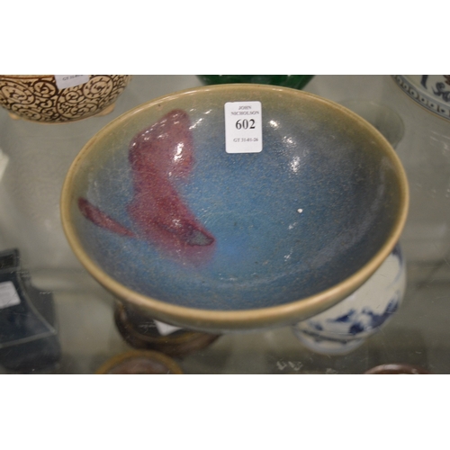 602 - A Chinese Jun glazed circular bowl.