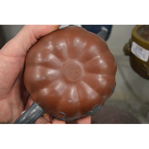 609 - A Chinese melon shaped Yixing teapot.