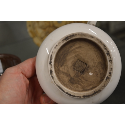 611 - A Chinese blanc de chine twin handled censer.