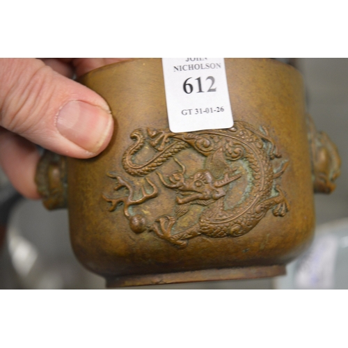 612 - A Chinese bronze censer cast with a dragon.