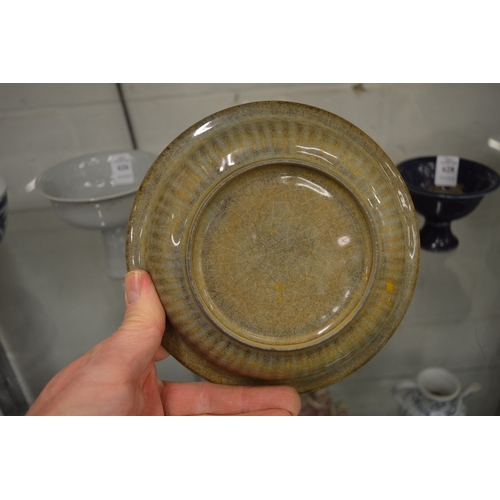 623 - A Chinese crackle glazed dish moulded with two fish.