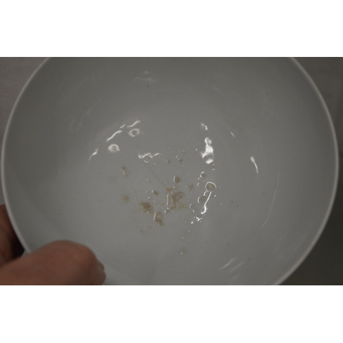 625 - A good Chinese blue and white dragon bowl with four character mark to the base.