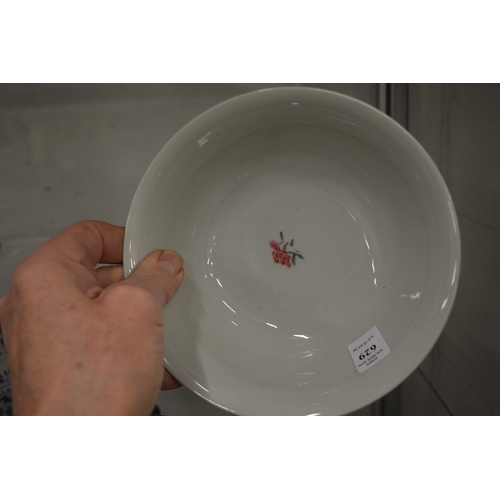 629 - A good Chinese circular bowl painted with flowers, six character mark to the base.