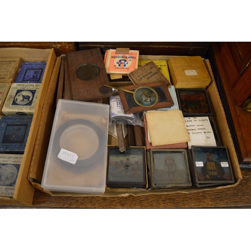 639 - A good Victorian brass and mahogany slide projector, converted to electricity complete with numerous... 