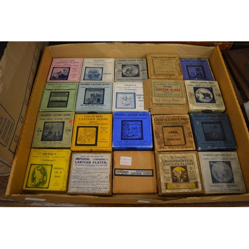 639 - A good Victorian brass and mahogany slide projector, converted to electricity complete with numerous... 