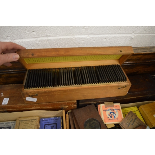 639 - A good Victorian brass and mahogany slide projector, converted to electricity complete with numerous... 