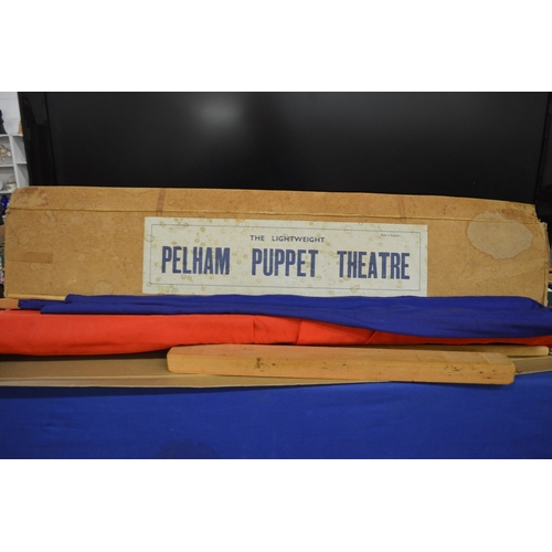 655 - A quantity of Pelham puppets and a Pelham puppet theatre with original box.