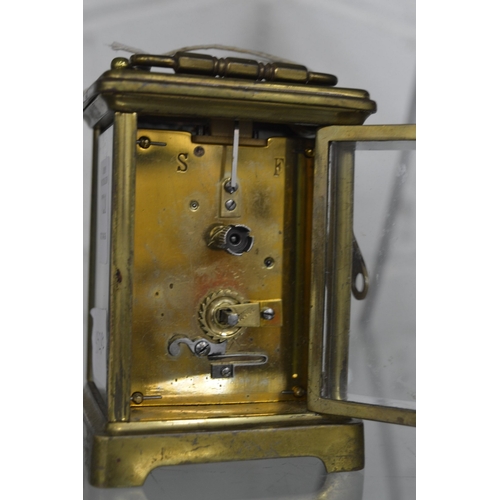 721 - A brass carriage clock.