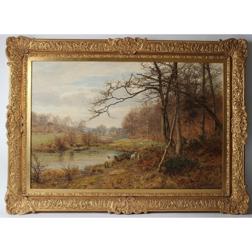 160 - FRANK WALTON (1840-1928)  Autumnal  river landscape  oil on canvas  signed  50 x 75cm