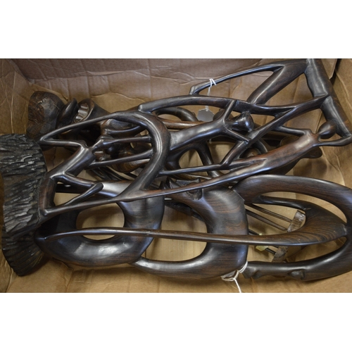 122 - Carved wood African figure groups.