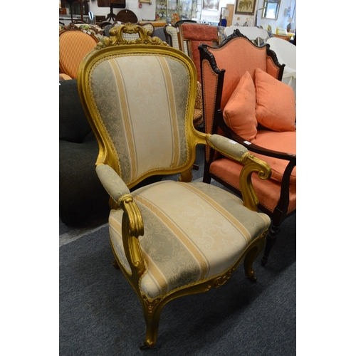 320 - A French style gilt framed open armchair.