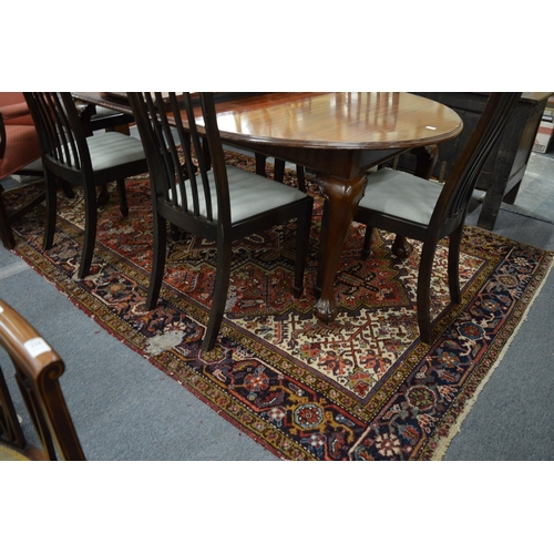 354 - A Persian rug with geometric design (moth damage) 284cm x 192cm.