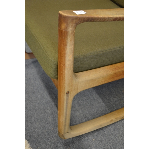 392 - Finn Juhl for France and Son, teak framed three seater settee with matching armchair and rocking cha... 