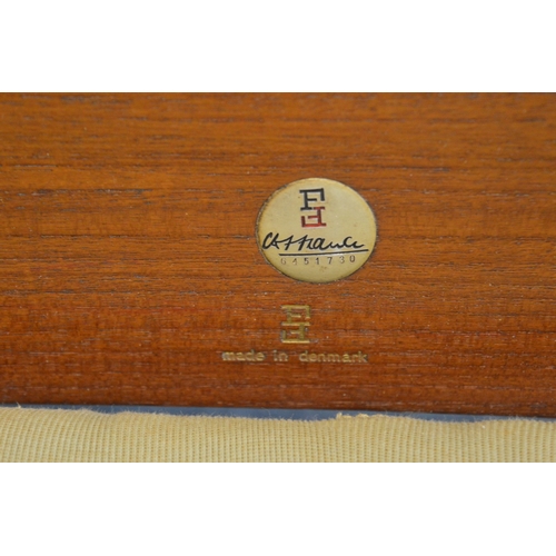 392 - Finn Juhl for France and Son, teak framed three seater settee with matching armchair and rocking cha... 