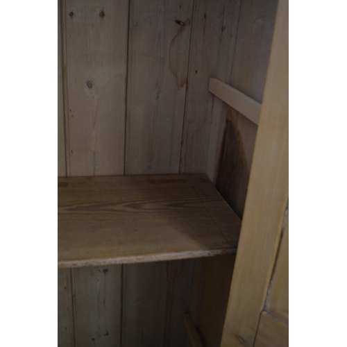 398 - A pine floor standing single door cupboard.