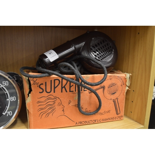 97 - An L G Hawkins Supreme bakerlite hairdryer with original box.