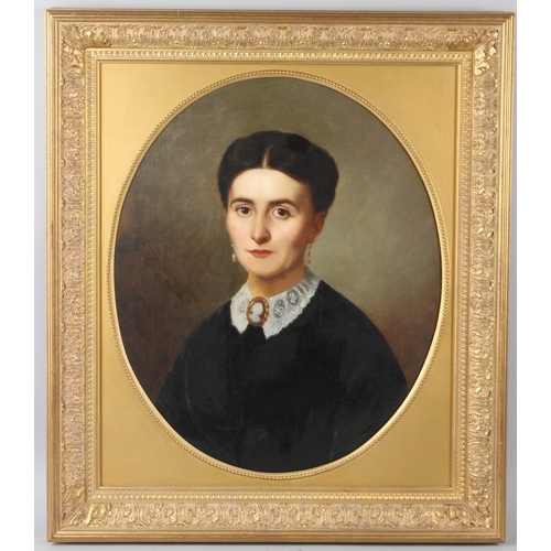307 - 19TH CENTURY SCHOOL  Head and shoulder portrait of a woman  oil on canvas  oval mount  58 x 48cm