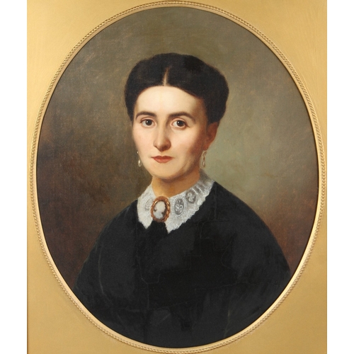 307 - 19TH CENTURY SCHOOL  Head and shoulder portrait of a woman  oil on canvas  oval mount  58 x 48cm