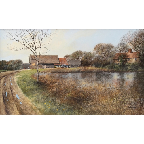 345 - CLIVE MADGWICK (1934-2005)  View of farm and pond  oil on board  signed  19.5 x 32cm