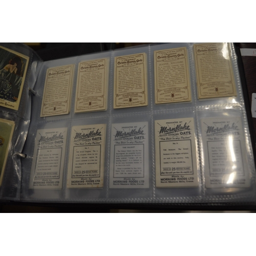 741 - Four albums of cigarette cards.