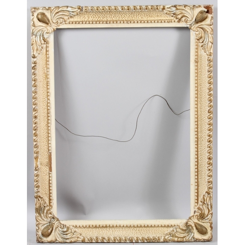 284 - PICTURE FRAME with gilt and gesso decorative border aperture 66.5 x 46.5cm overall 78 x 59.5cm (a/f)... 