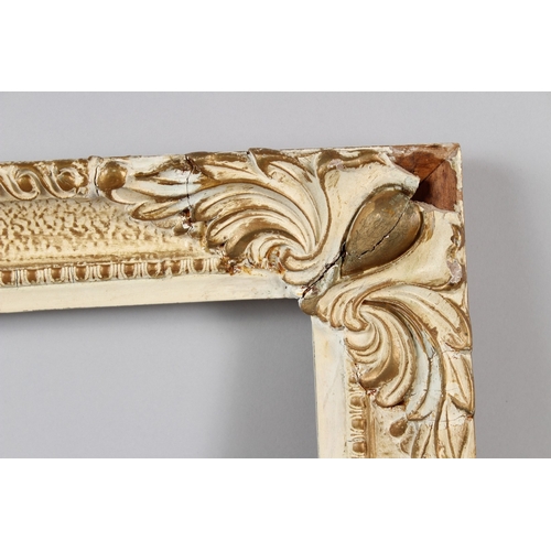 284 - PICTURE FRAME with gilt and gesso decorative border aperture 66.5 x 46.5cm overall 78 x 59.5cm (a/f)... 