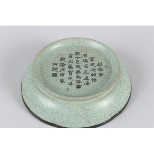 12 - A CHINESE RU WARE DISH.  15cms diameter.