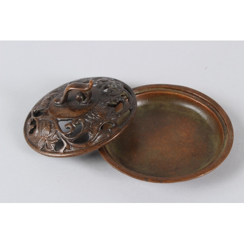 13 - A TIBETAN BRONZE INCENSE BURNER.  11cms diameter.
