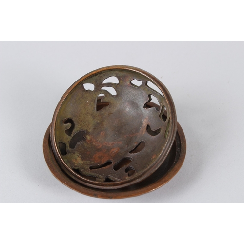 13 - A TIBETAN BRONZE INCENSE BURNER.  11cms diameter.