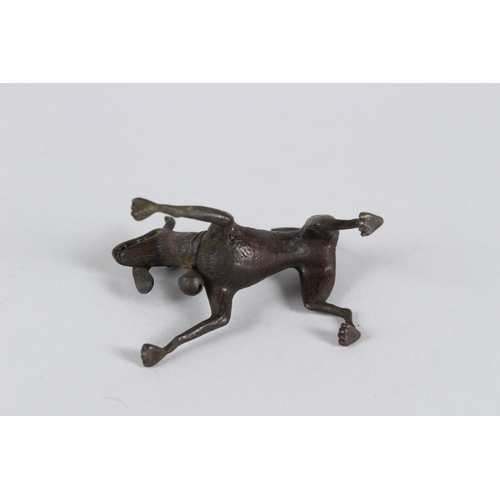 19 - A JAPANESE BRONZE DOG.  6cms long.