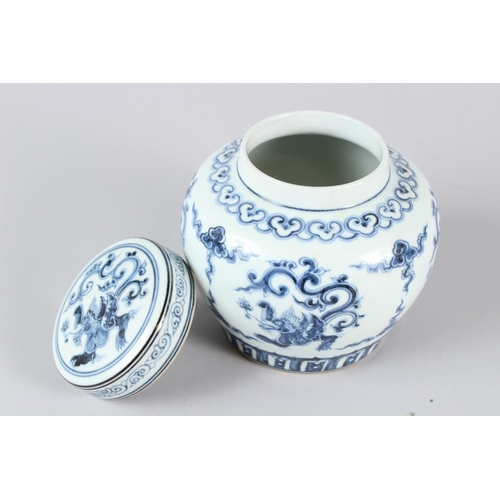 24 - A CHINESE BLUE AND WHITE GINGER JAR AND COVER.  13cms high.