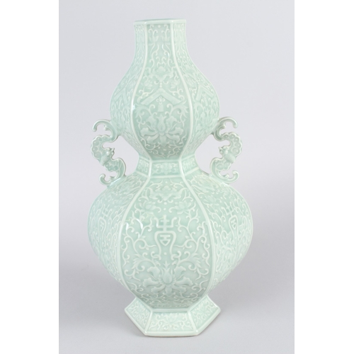 29 - A FINE CHINESE CELADON CARVED 
