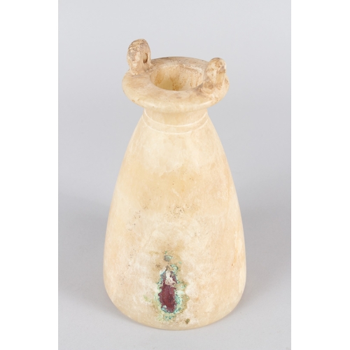 35 - AN EGYPTIAN ALABASTER SITULA, NEW KINGDOM, Circa. 1550-1070 BC, with ring handles to the circular to... 
