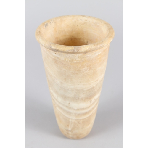 37 - AN EGYPTIAN ALABASTER VESSEL, OLD KINGDOM, Circa. 3000-2600 BC, of cylindrical tapering form.  21cms... 