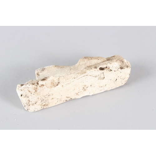 38 - AN EGYPTIAN CARVED LIMESTONE USHABTI.  13.5cms long.